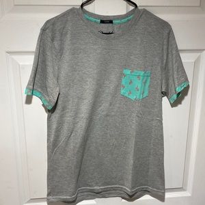 Men’s short sleeve shirt with front pocket and flamingo design